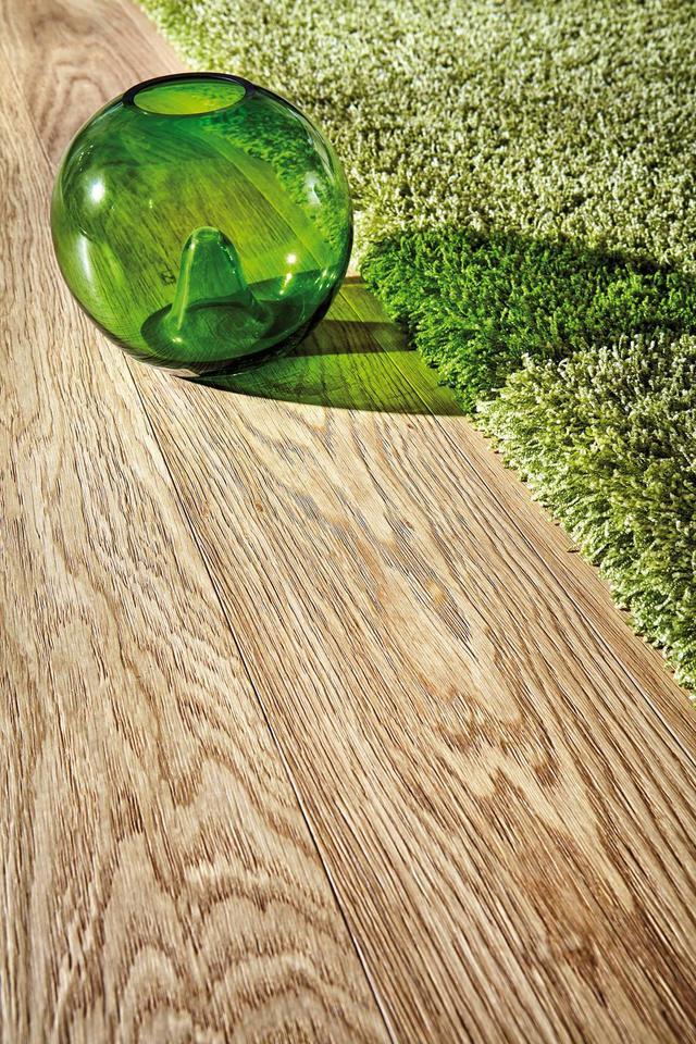 推动行业的未来发展，卡曼国际退出SPC地板